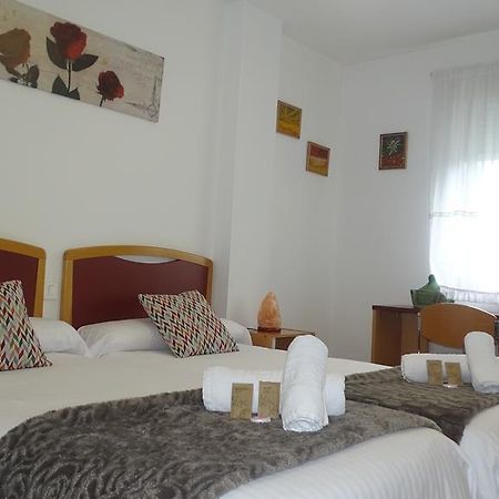 لوغو Hostal Lucus المظهر الخارجي الصورة