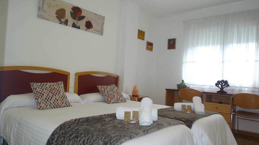 لوغو Hostal Lucus المظهر الخارجي الصورة
