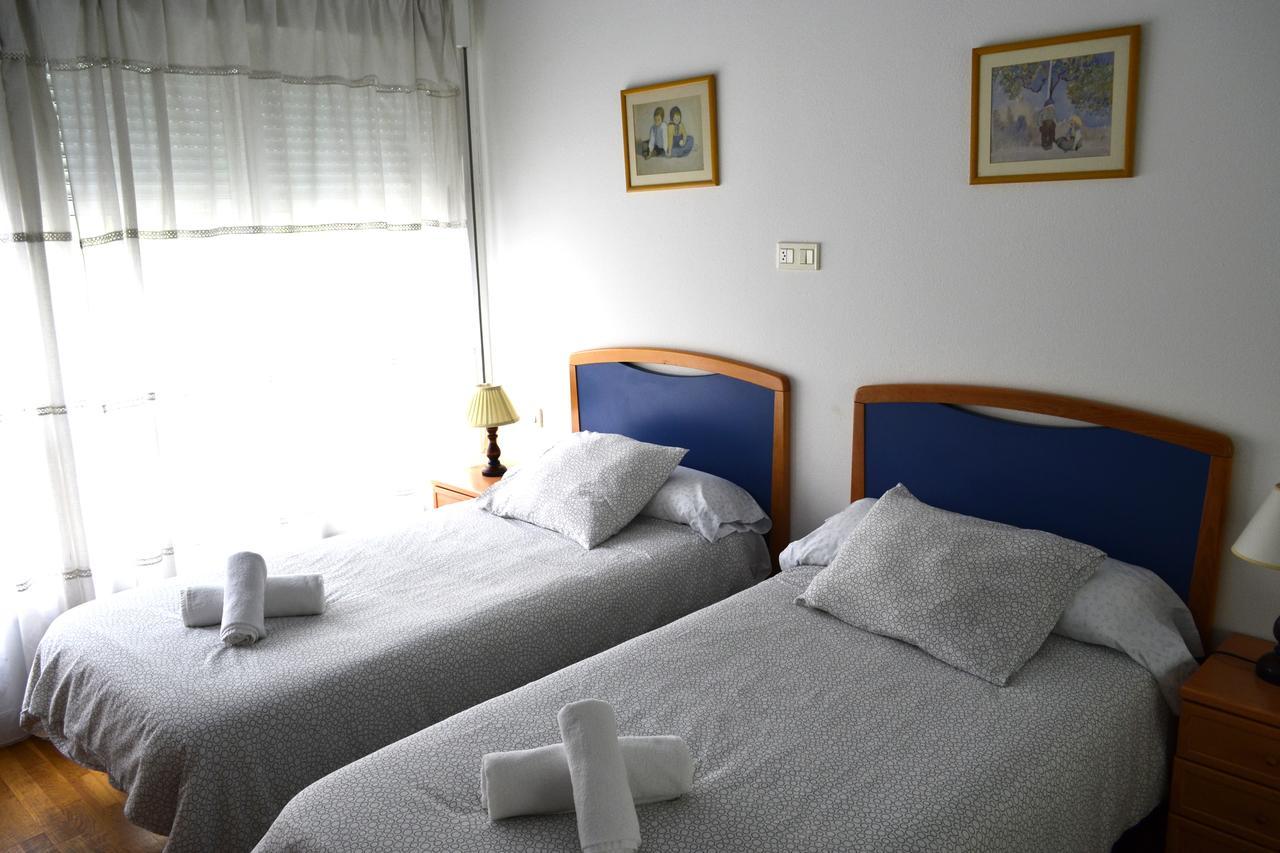لوغو Hostal Lucus المظهر الخارجي الصورة