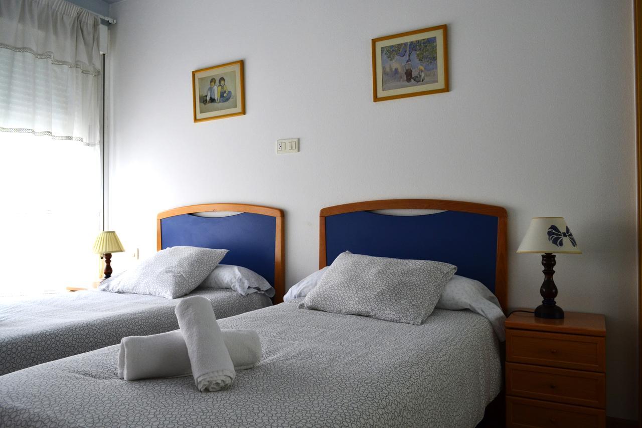لوغو Hostal Lucus المظهر الخارجي الصورة