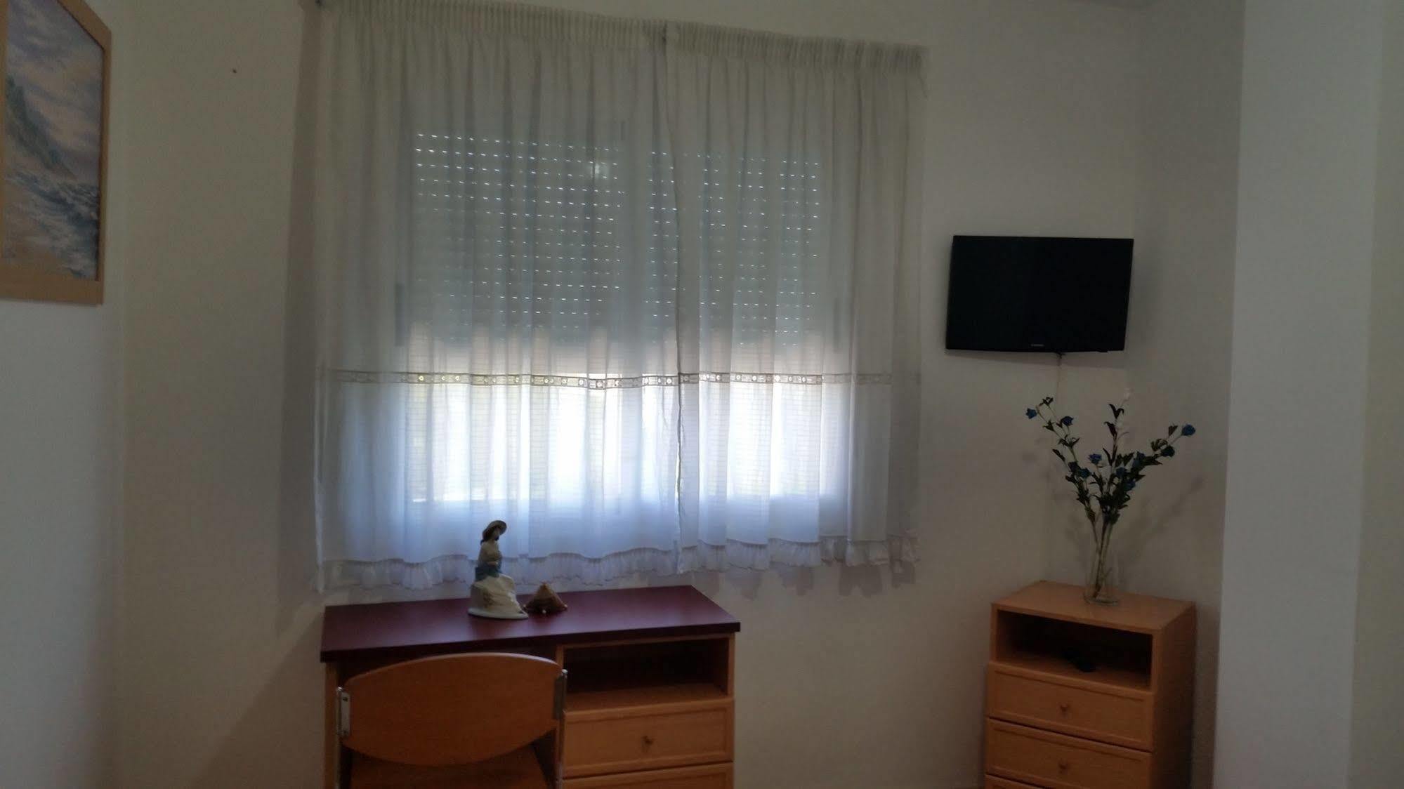 لوغو Hostal Lucus المظهر الخارجي الصورة