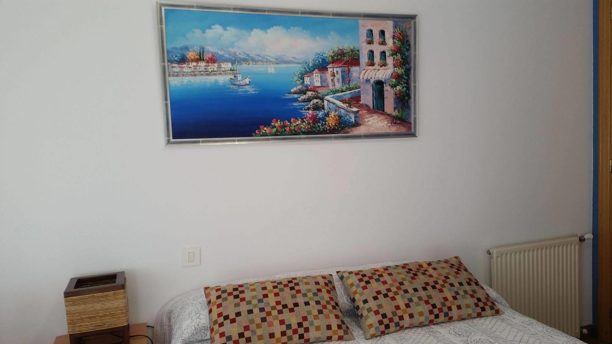 لوغو Hostal Lucus المظهر الخارجي الصورة